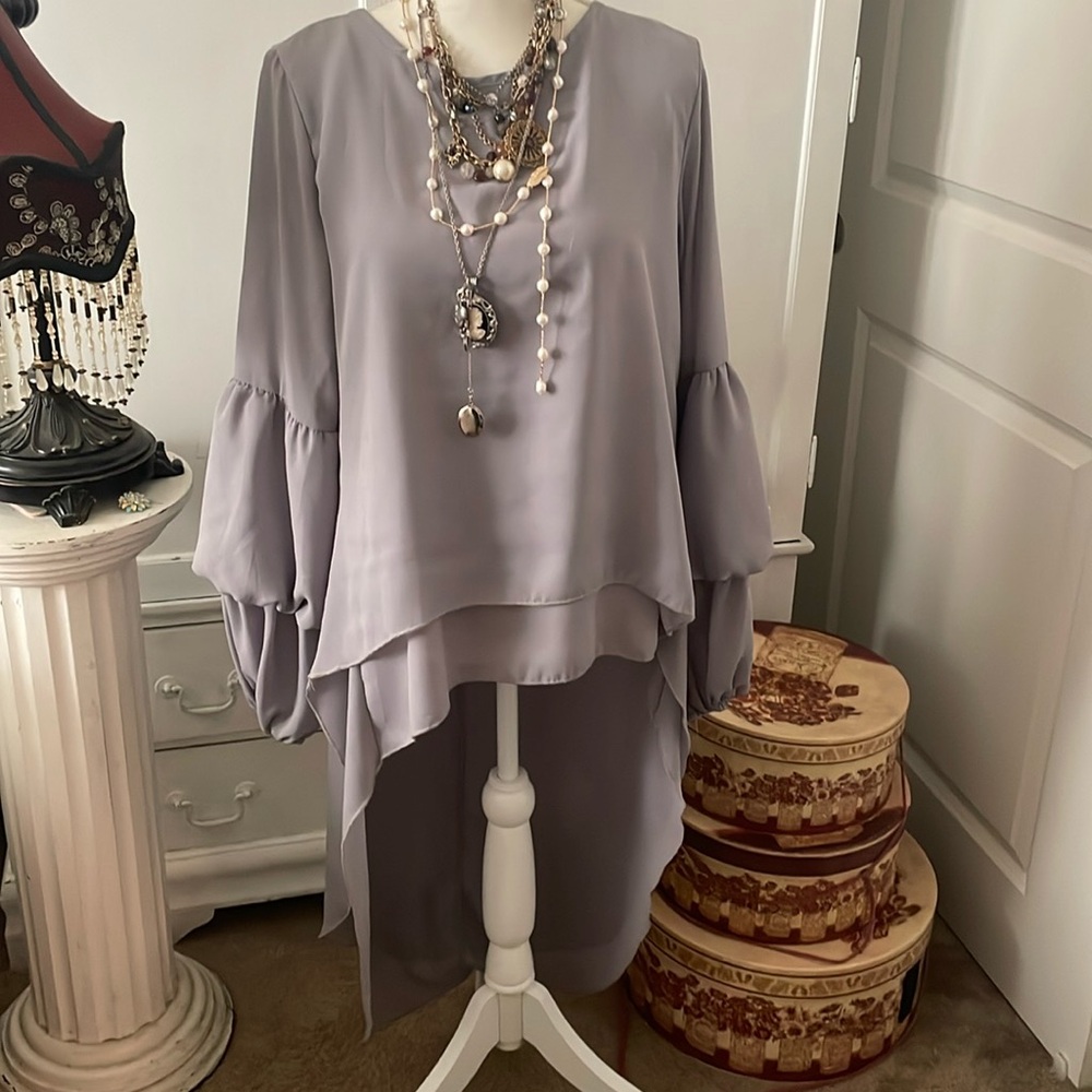 ￼ Unique, high low blouse ￼